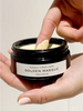 female hands-scooping-beauty-treatment-mask